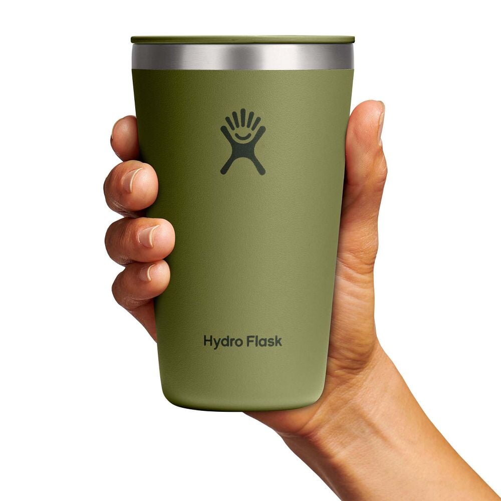 Olive-green Hydro Flask insulated tumbler with lid, stainless-steel rim, small sip opening, matte finish, and Hydro Flask logo on front. Modern design.